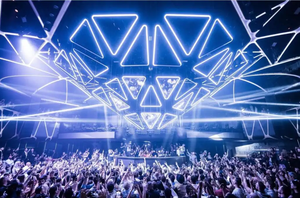 Hakkasan Nightclub main room at MGM Grand Las Vegas with the DJ booth, dance floor, LED production grid, and surrounding VIP seating.