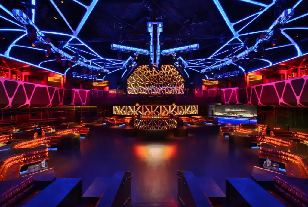 Hakkasan Nightclub bottle service tables surrounding the main room dance floor and DJ booth at MGM Grand Las Vegas.