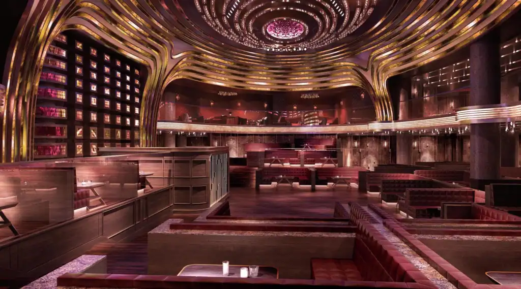 Jewel Nightclub bottle service tables surrounding the main-room dance floor and DJ booth inside ARIA Resort and Casino.